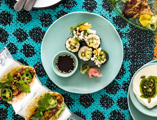 A Table With Plates Of Food