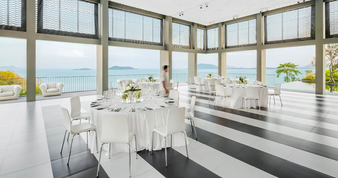 A Room With A Table And Chairs