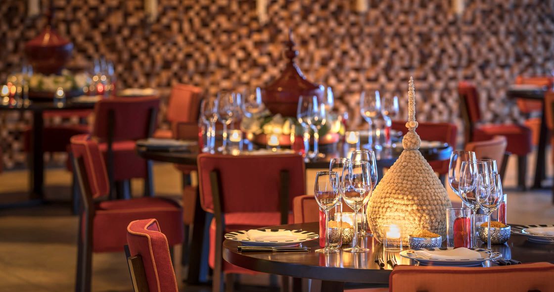 A Table With Glasses And Plates On It