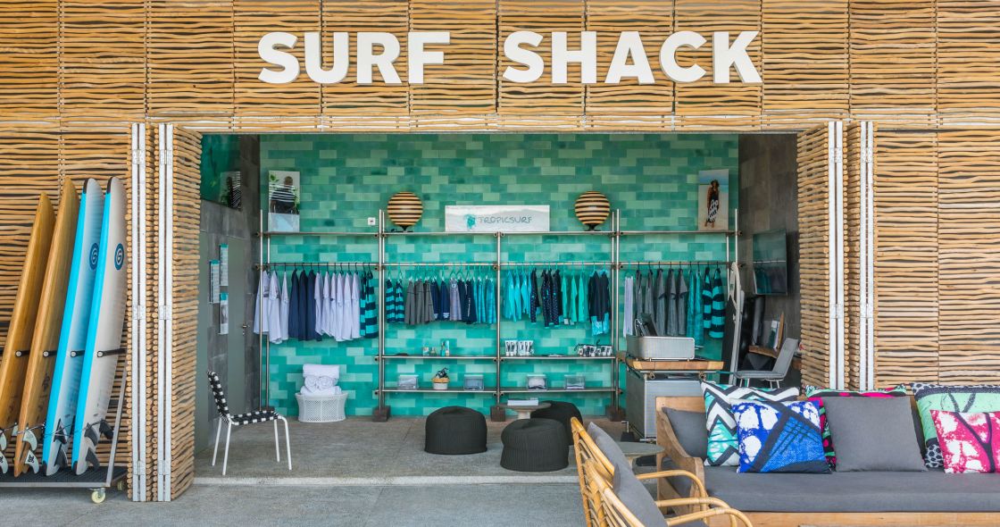 A Garage With A Bench And A Garage Door