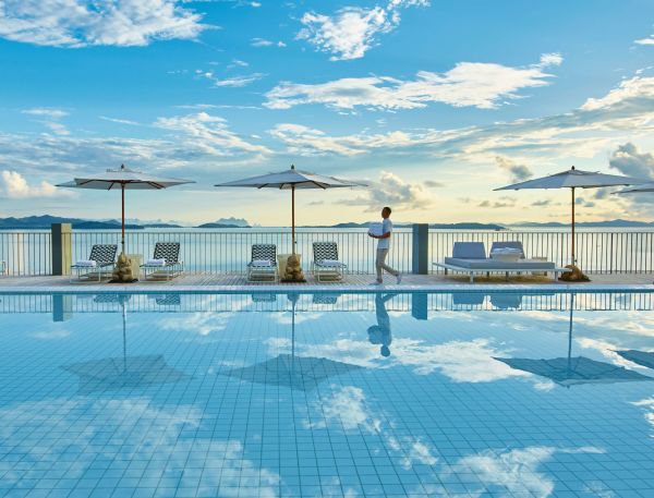 A Person Standing On A Deck