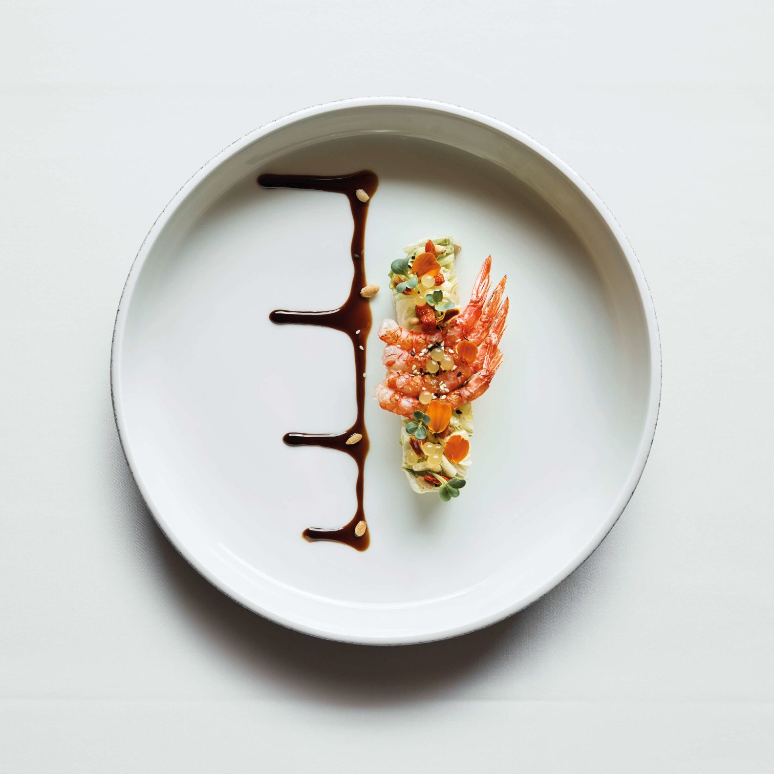 A Plate With A Tree Branch On It