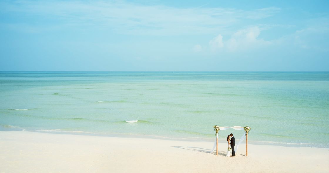 A Couple People On A Beach