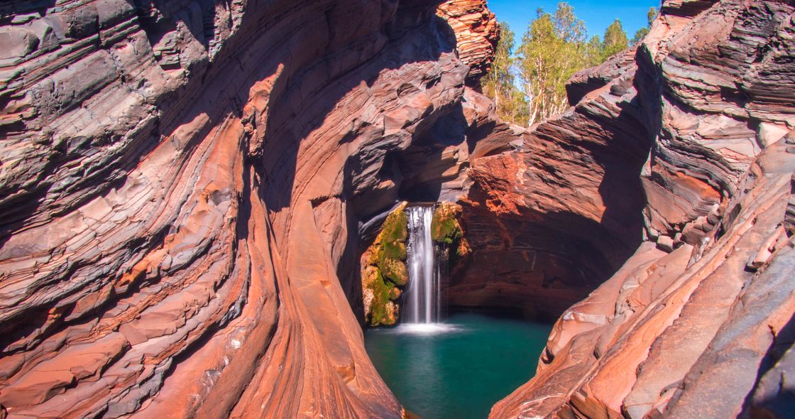 A Waterfall In A Canyon