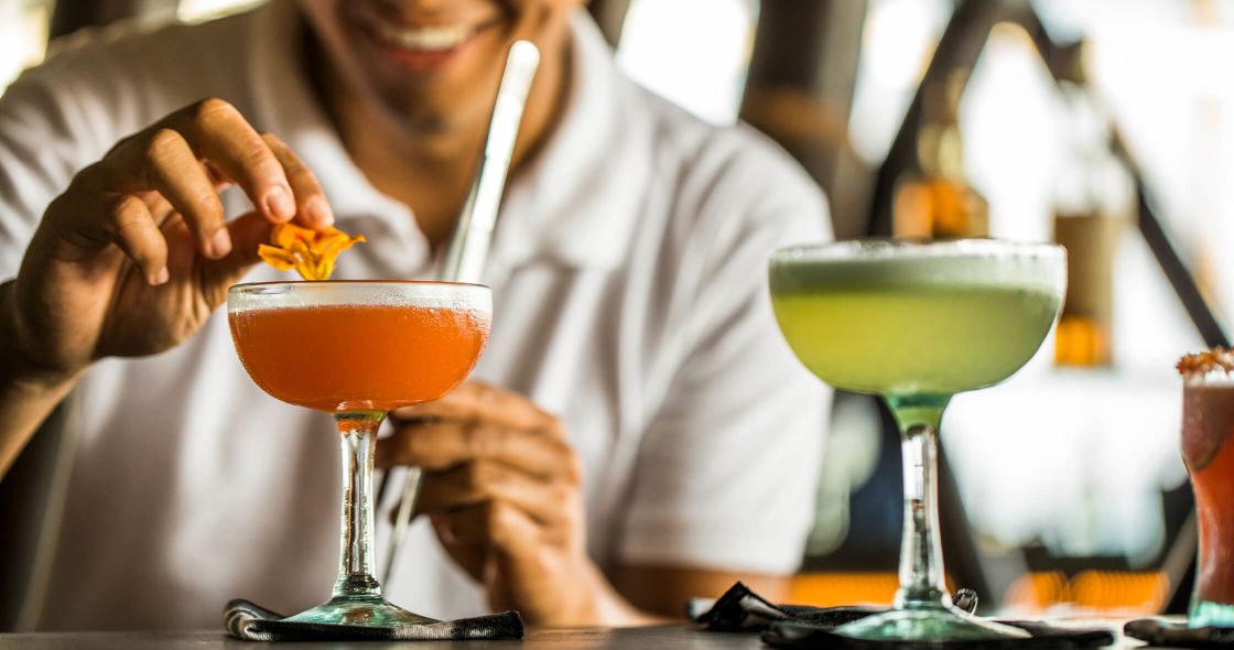 A Person Holding A Yellow Flower