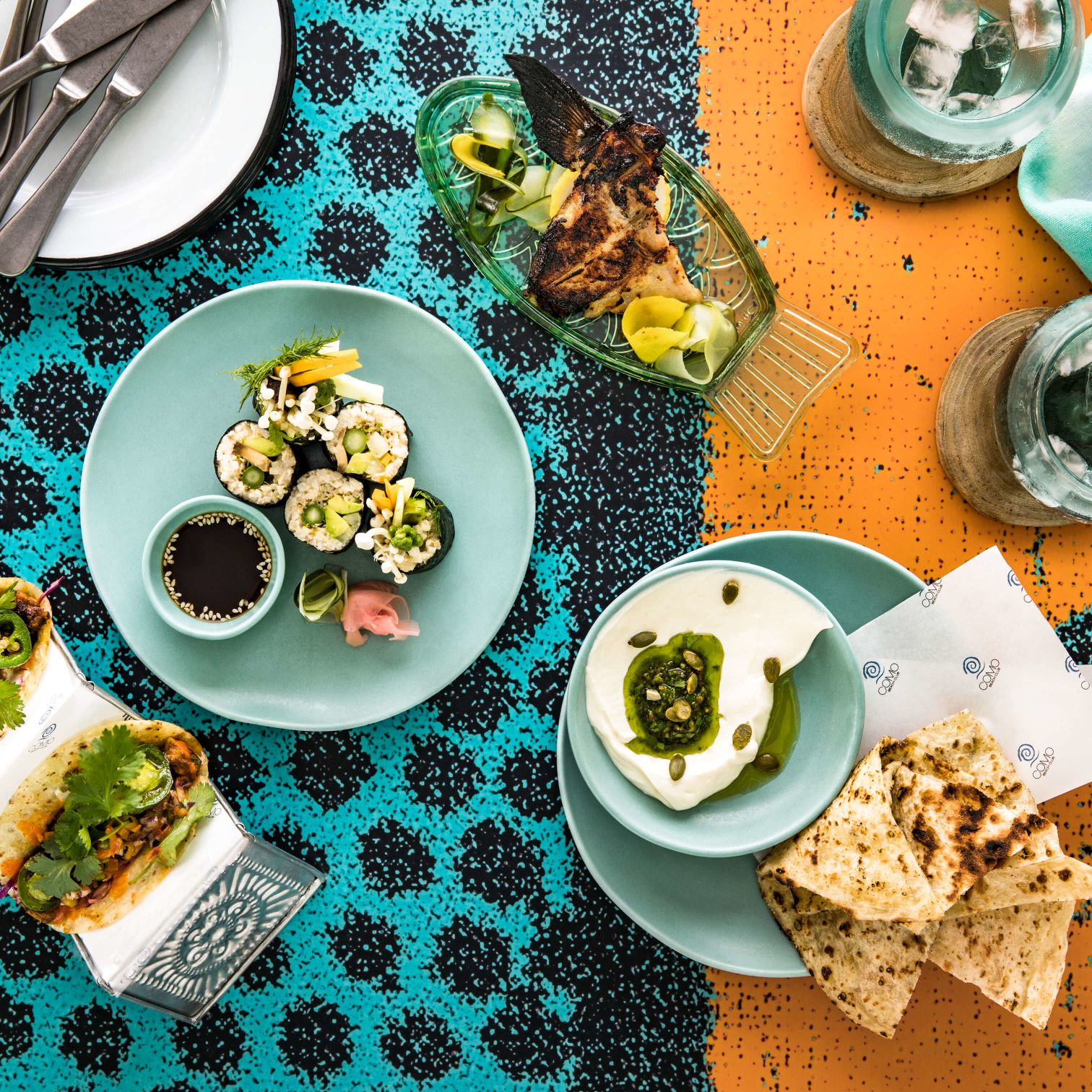 A Table With Plates Of Food