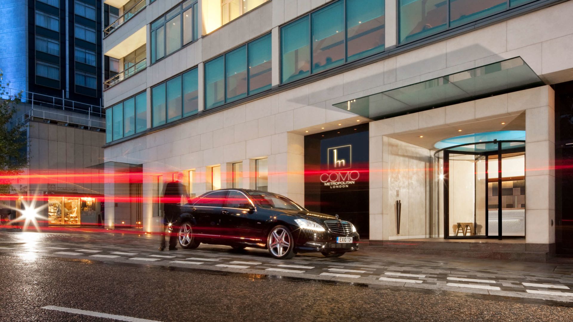 A Car Parked Outside A Building
