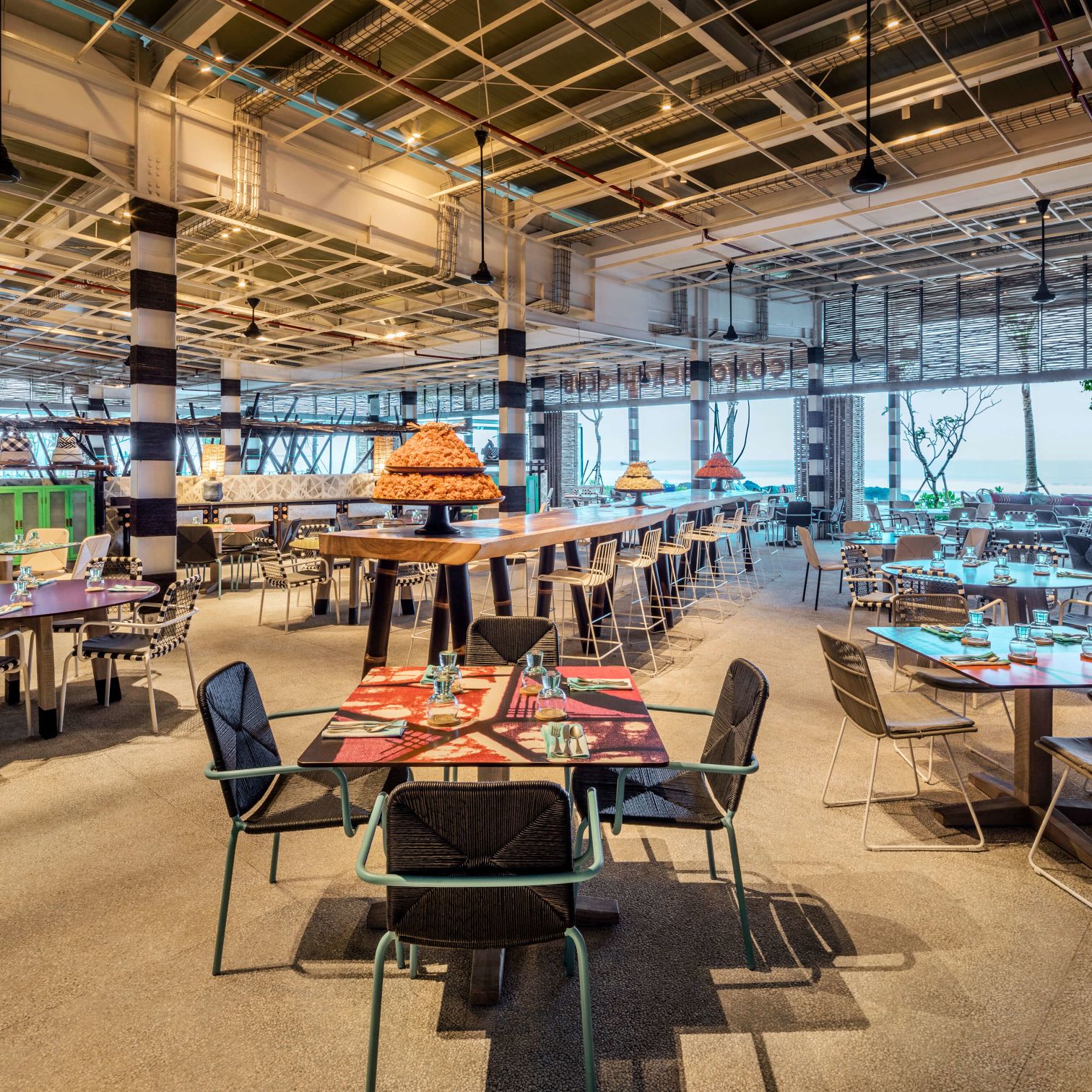 A Room With Tables And Chairs