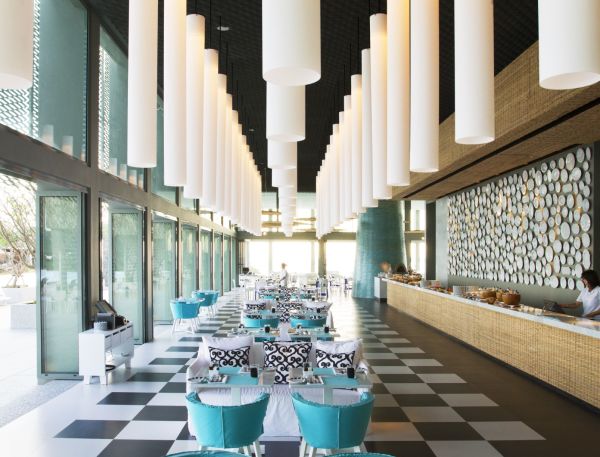 A Room With Tables And Chairs