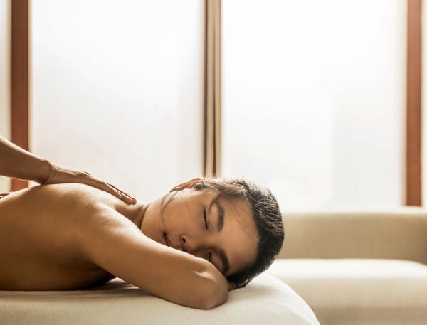 A Person Lying On A Couch