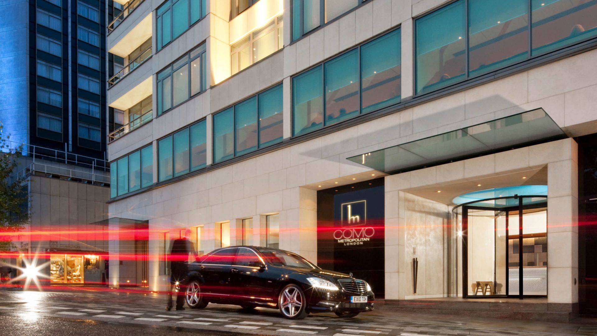A Car Parked Outside A Building