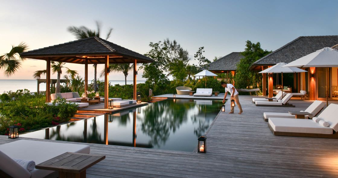 A Person Standing In A Pool