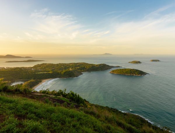 A Body Of Water With Land Around It